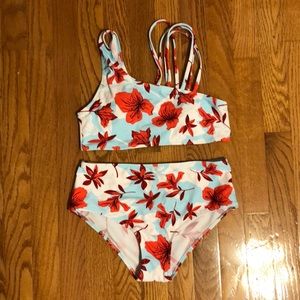 Small red, light blue, and white floral swimsuit